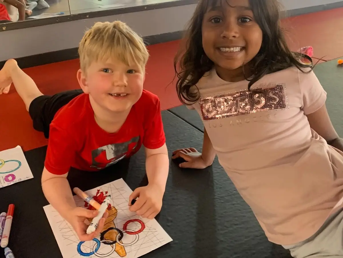 Kids doing arts and crafts at Kaizen MMA summer camp